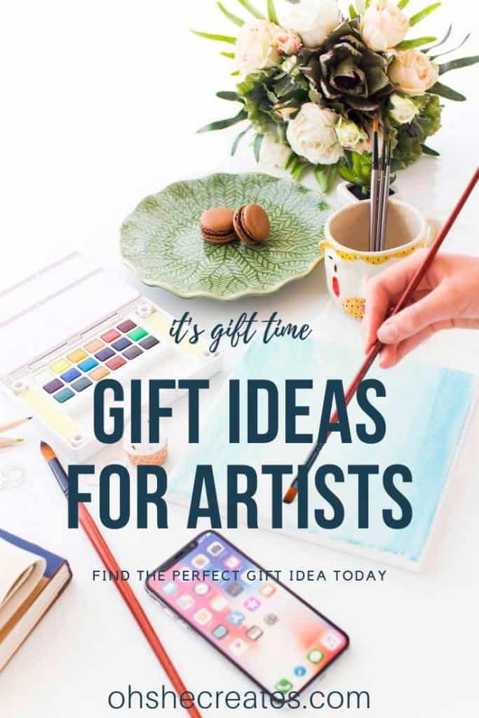 Gift ideas for artists with paints on a desk and watercolors