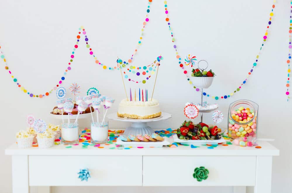 image of party decor on table with bunting